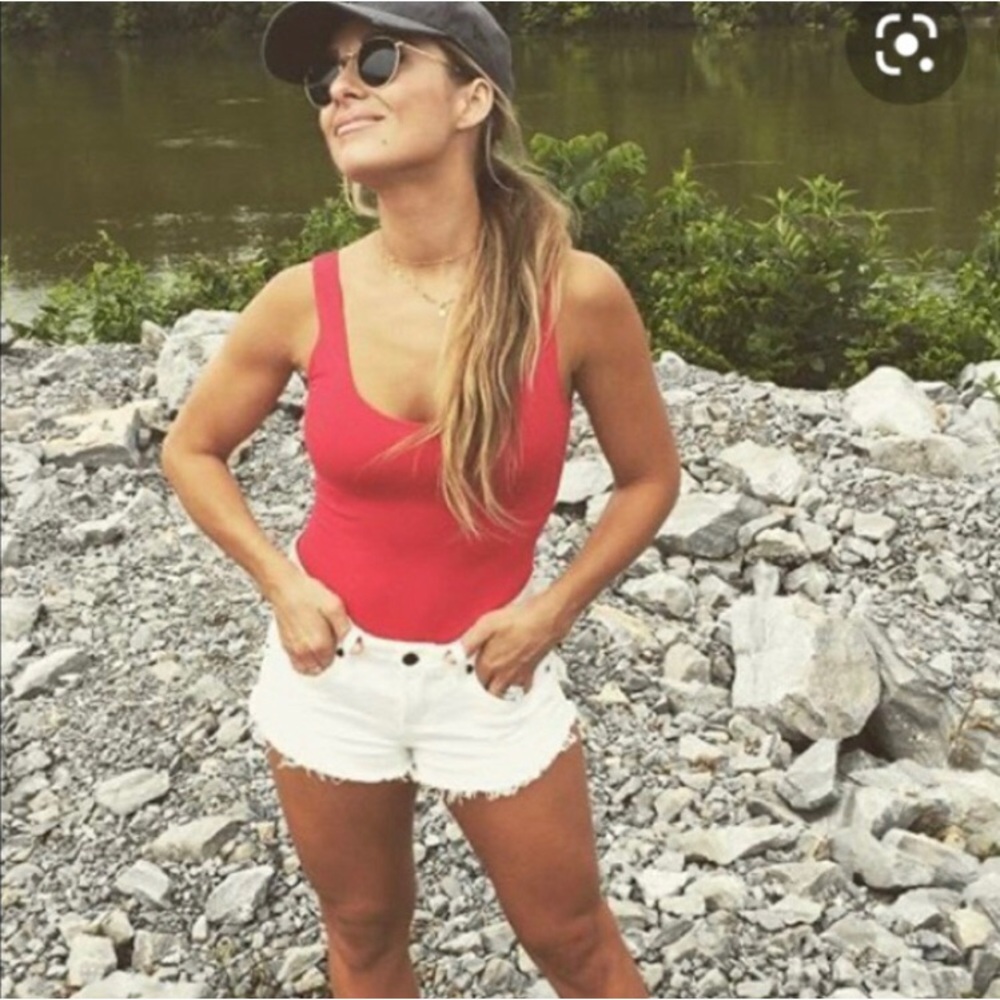 Kittenish white distressed jean shorts. Never worn.
